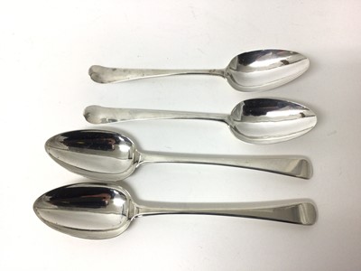 Lot 209 - Two pairs of George III silver table spoons