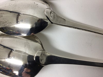 Lot 209 - Two pairs of George III silver table spoons