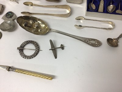 Lot 210 - Miscellaneous group of silver and plated wares to include an Art Deco silver flask, Burmese white metal flask, pair of Victorian Scottish silver knife rests, Victorian silver bowl, silver vesta cas...
