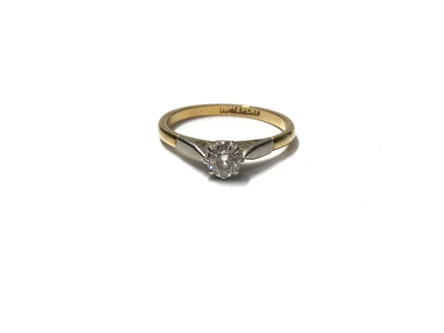Lot 2 - Diamond single stone ring with a brilliant cut diamond estimated to weigh approximately 0.25cts in platinum setting on 18ct yellow gold shank