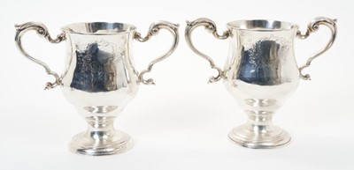 Lot 344 - Pair of George III Irish silver twin handled cups by Matthew West, Dublin,  circa 1780.