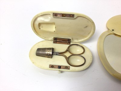 Lot 6 - Two 19th century ivory cased etui cases and cased mirror