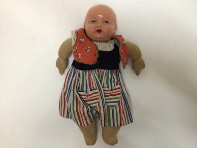 Lot 1895 - Hornby clockwork speedboat, together with an antique doll