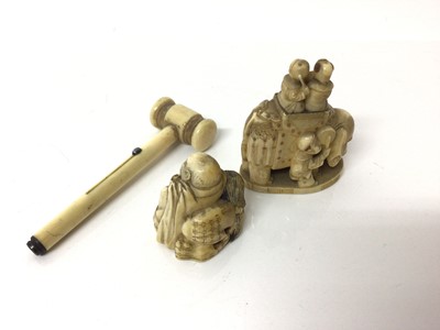 Lot 20 - Japanese carved ivory netsuke, together with an okimono and a carved ivory combination gavel and pencil