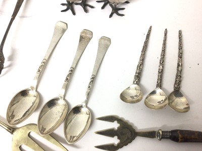 Lot 55 - Three Danish silver teaspoons, three South American 'totem pole' spoons, pair of unusual Victorian novelty silver plated egg cups and other plated items