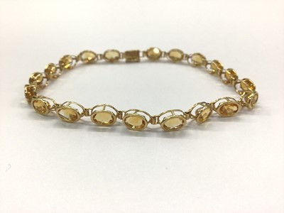 Lot 650 - 18ct gold citrine bracelet