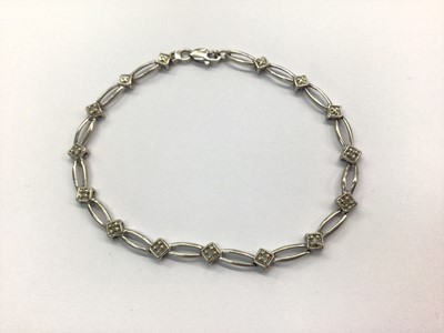 Lot 651 - 9ct white gold diamond bracelet