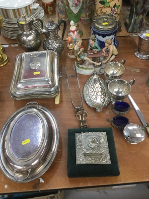 Lot 352 - Three silver plated entree dishes, biscuit barrel with silver plated mounts, china figures and other items.