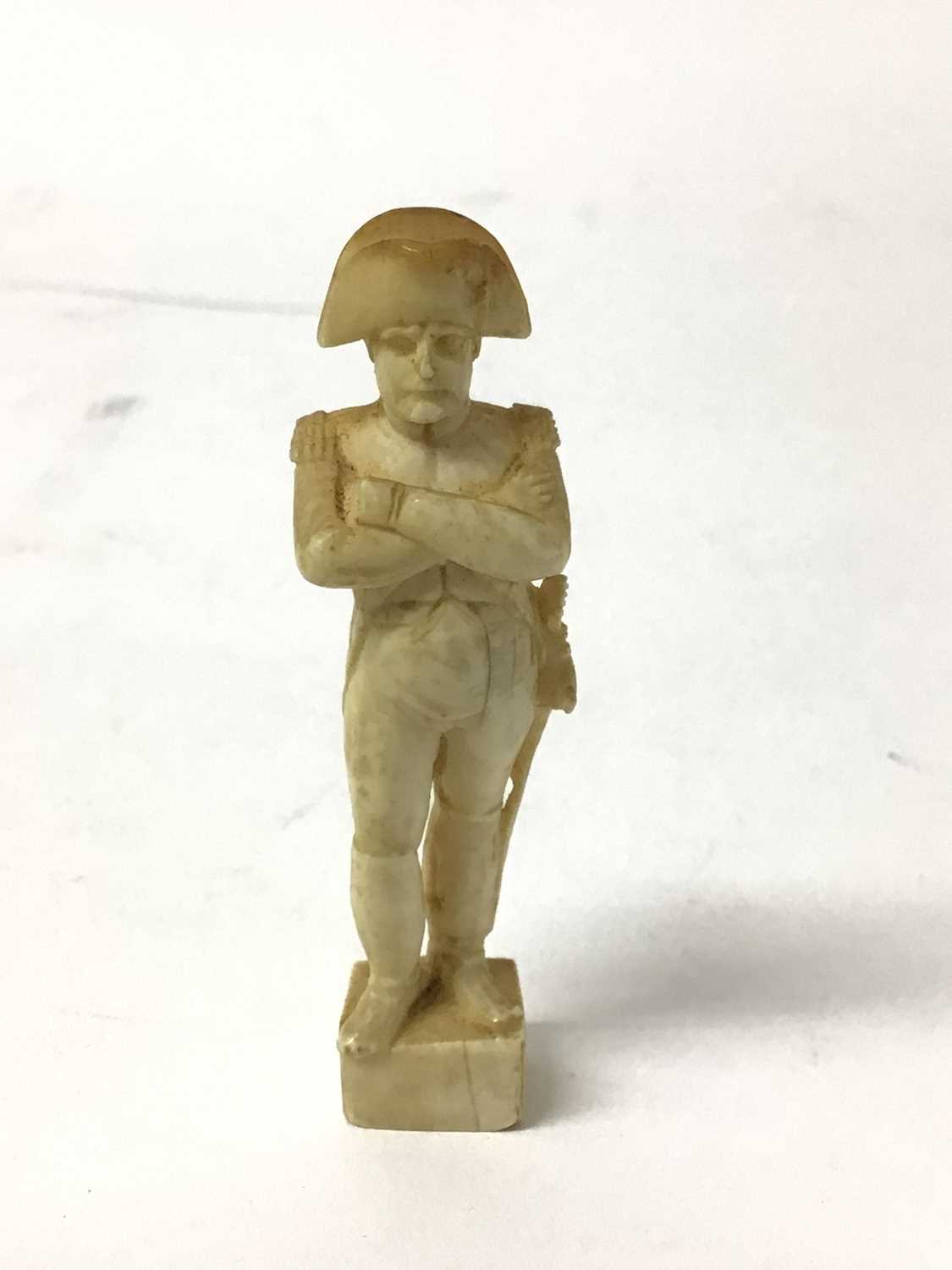 Lot 54 - 19th century carved ivory figure of Napoleon