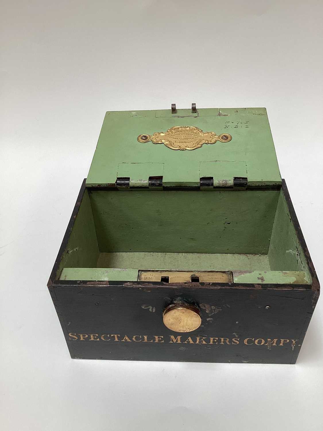 Lot 2426 - Victorian Chubb & Son safe / strong box with painted naming to front- Spectacle Makers Compy.