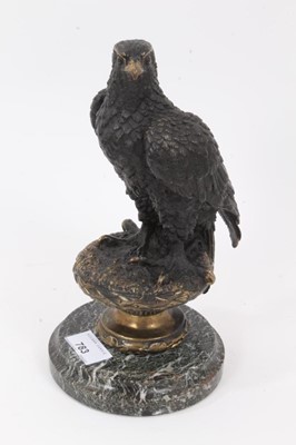 Lot 783 - Bronze figure of an eagle, raised on circular marble base