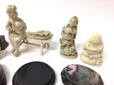 Lot 15 - Group of antique ivory, including a pair of Indian figures of gods, a dice shaker, a relief carved box, an okimono, a Canton puzzle ball stand, a clam netsuke, and two other figures, along with sto...