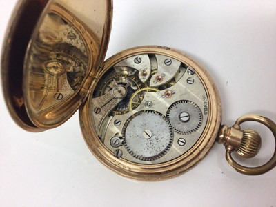 Lot 661 - Gold plated half hunter pocket watch