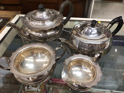 Lot 321 - Silver plated three piece tea set and one other teapot