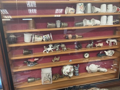 Lot 205 - Two wall hanging curiosity cabinets, silver plate, hand puppet and other items