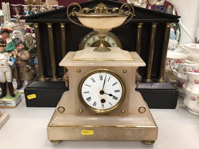 Lot 304 - Early 20th century black slate mantel clock, together with two mantel clocks with presentation plaques and another mantel clock (4)