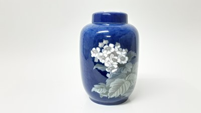 Lot 1180 - Royal Copenhagen porcelain vase and cover with floral decoration on blue ground