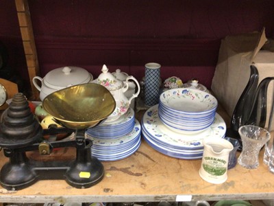 Lot 574 - Three shelves of assorted china and glassware to include Midwinter Homemaker plates, dinnerware, kitchen scales and sundries