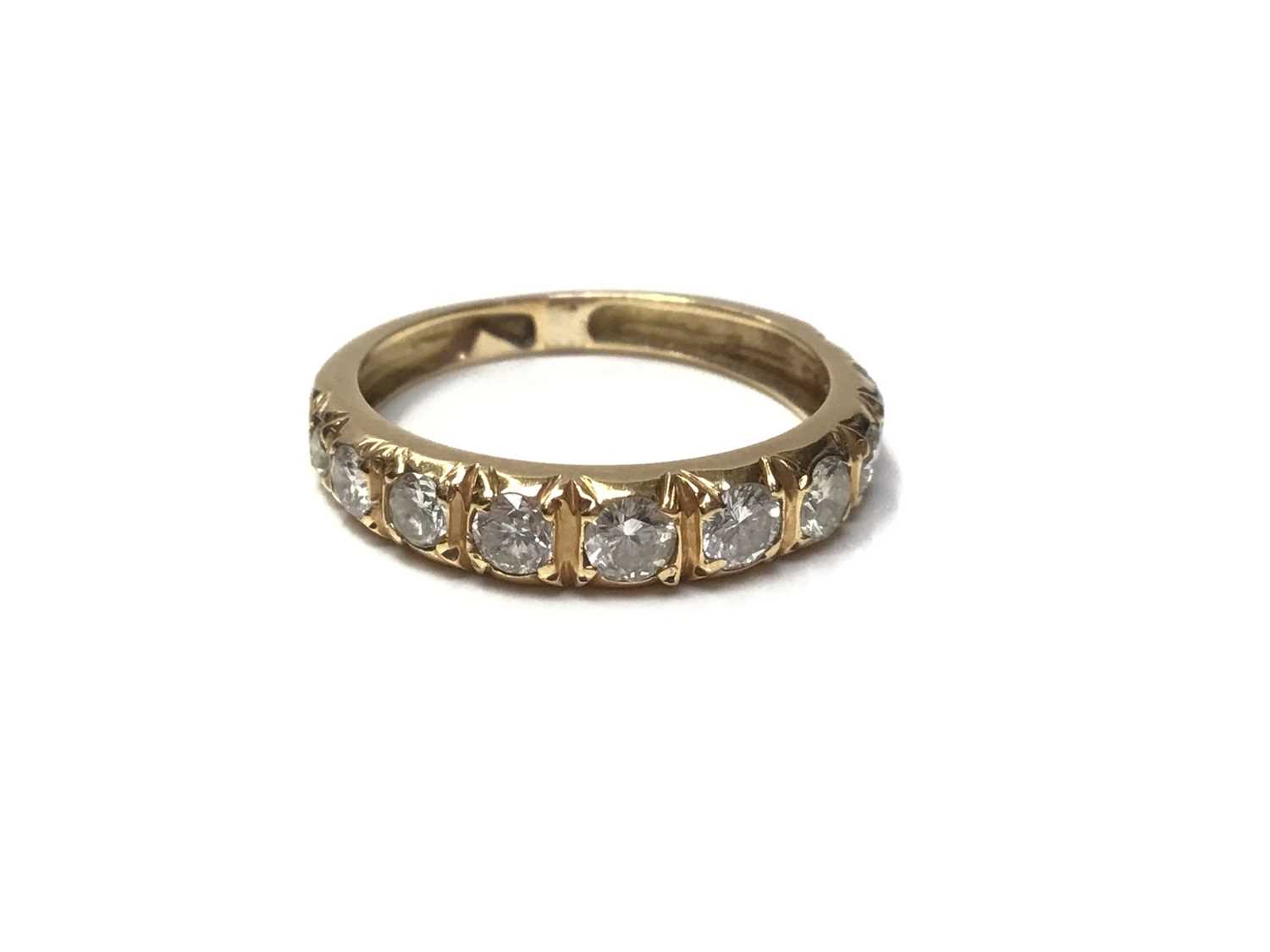 Lot 31 - Diamond ten stone half eternity ring