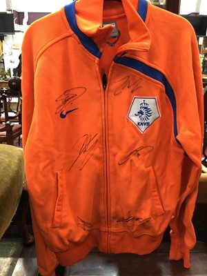 Lot 450 - Football related items to include signed Netherlands track suit top, framed reproduction cigarette cards