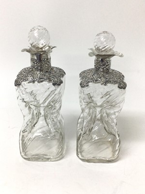 Lot 95 - Pair Victorian silver mounted glass sherry decanters