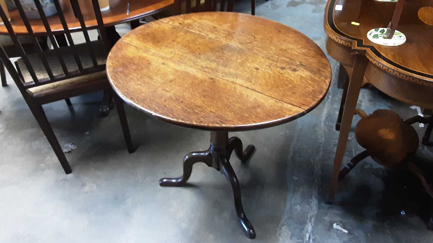 Lot 984 - 18th century oak tilt top tripod table