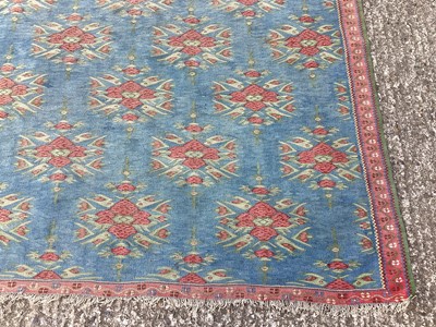 Lot 1450 - Kelim rug on blue ground 130cm x 200cm