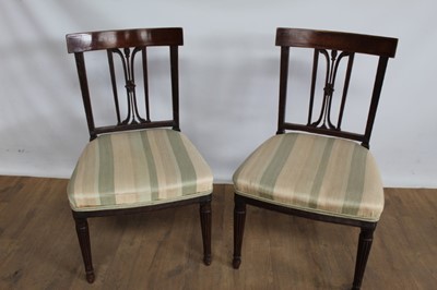 Lot 1009 - Pair of 19th century mahogany dining chairs with reeded supports and striped upholstered seats