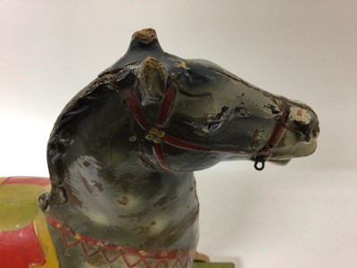 Lot 1926 - old painted child's horse on wheels