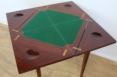Lot 88 - Edwardian inlaid mahogany envelope top card table with single drawer, on square taper legs terminating on castors