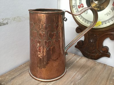 Lot 332 - Arts and Crafts copper jug decorated with hearts