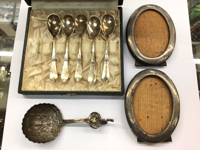 Lot 678 - Five Danish silver teaspoons in case, pair of oval silver frames and Dutch silver spoon