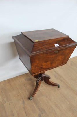 Lot 87 - Victorian mahogany teapoy of sarcophagus form, on turned support and splayed tripod base