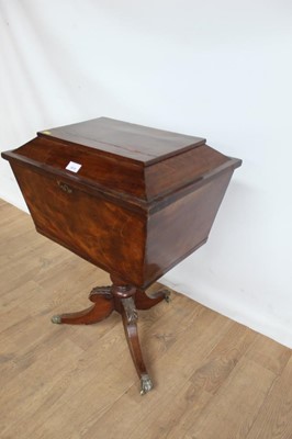 Lot 87 - Victorian mahogany teapoy of sarcophagus form, on turned support and splayed tripod base