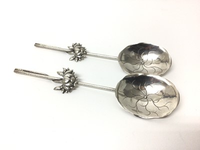 Lot 60 - Pair of Chinese silver spoons with lotus flower bowls, hallmarks to the handles