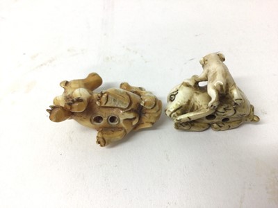 Lot 40 - Two 19th century Japanese ivory 'dog and puppy' netsuke