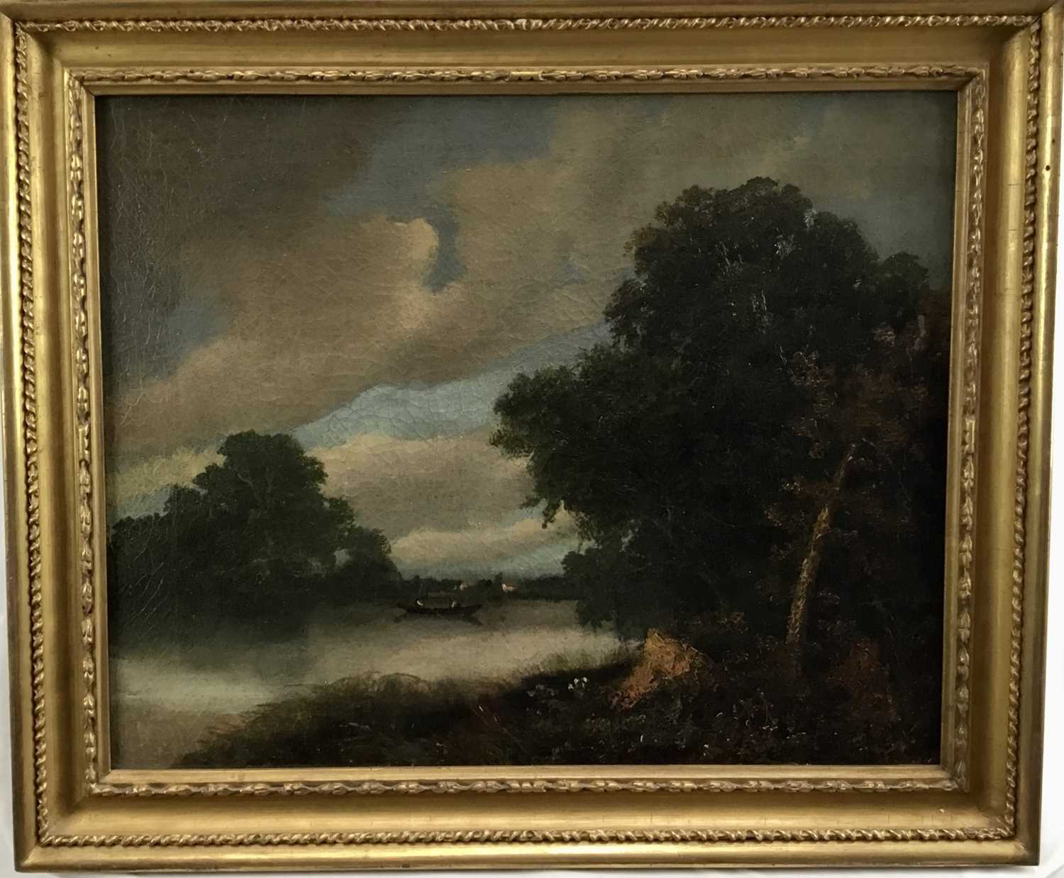 Lot 10 - oil on canvas landscape with fishermen in boat on a lake and village beyond, 52cm x 42cm in gilt frame