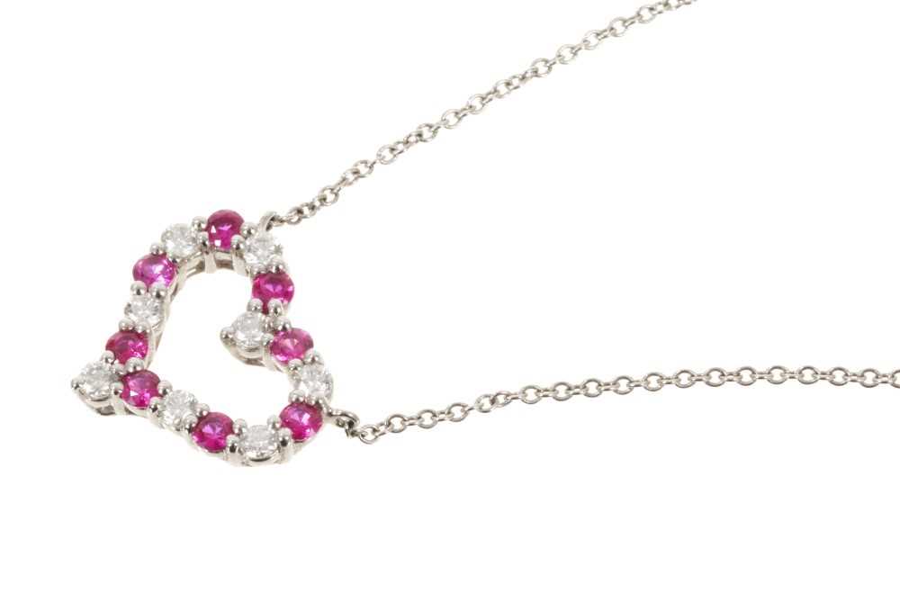 Lot 506 - Tiffany & Co. Diamond ruby and platinum heart pendant necklace