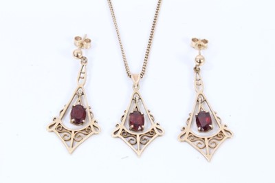 Lot 568 - 9ct gold and garnet pendant necklace and earrings