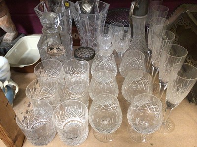 Lot 561 - Stuart Crystal cut glass table service, a tantalus, glass claret jug, decanter, pair of vases and two rose bowls