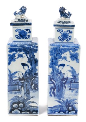 Lot 283 - Pair of 19th century Chinese Kangxi style blue and white porcelain vases and covers