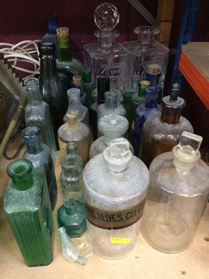 Lot 563 - Collection of antique glass apothecary jars/ bottles and various antique and vintage glass bottles