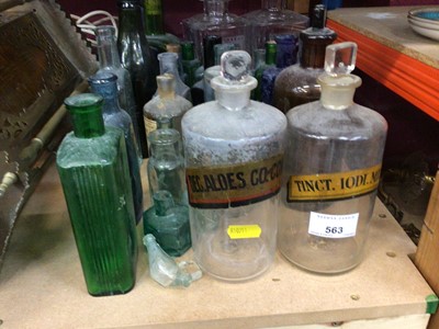 Lot 563 - Collection of antique glass apothecary jars/ bottles and various antique and vintage glass bottles