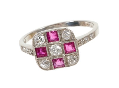 Lot 551 - Art Deco platinum diamond and ruby ring of chequerboard design.  Diamond set shoulders 'L' finger size