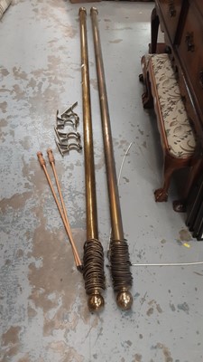 Lot 49 - Pair of brass curtain poles complete with rings 96"