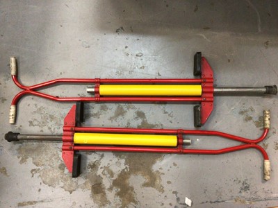 Lot 515 - Two pogo sticks