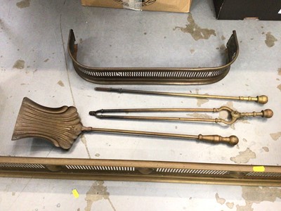 Lot 297 - Edwardian brass fire curb and fire implements