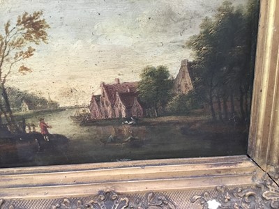 Lot 96 - 19th century English School oil on panel - village beside a river, in gilt frame
