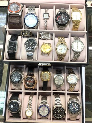 Lot 688 - Various wristwatches in glazed display case