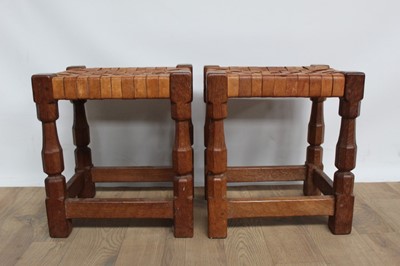 Lot 1323 - Pair of oak and woven leather stools, by David Langstaff in the Mouseman tradition